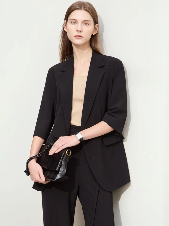 Loose blazer and high-waisted wide-legged trousers set 4