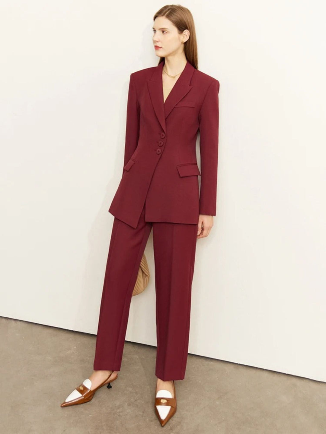 Minimalist blazer and high-waisted, tapered trousers set 0
