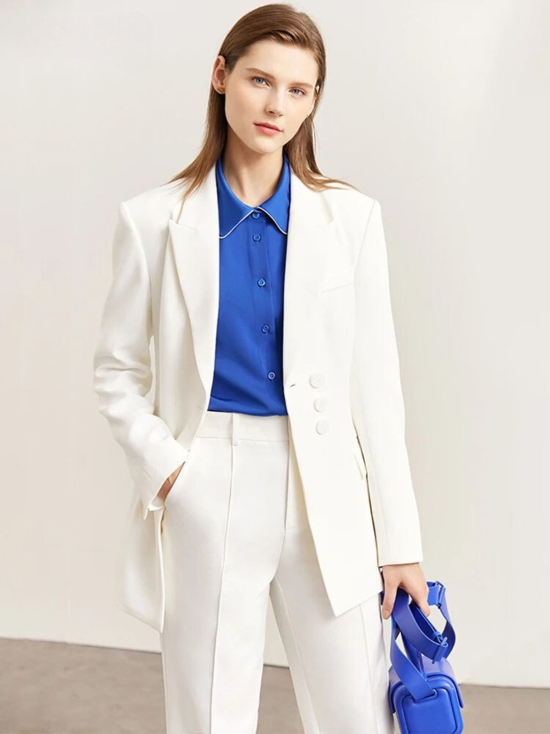 Minimalist blazer and high-waisted, tapered trousers set 7